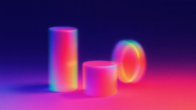 Glowing 3D cylinders and a ring in vibrant neon gradients