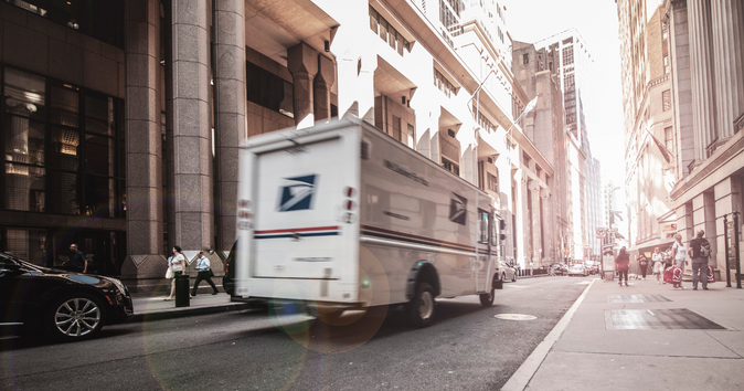 A delivery truck racing down the streets to represent expedited shipping: shipping date meaning