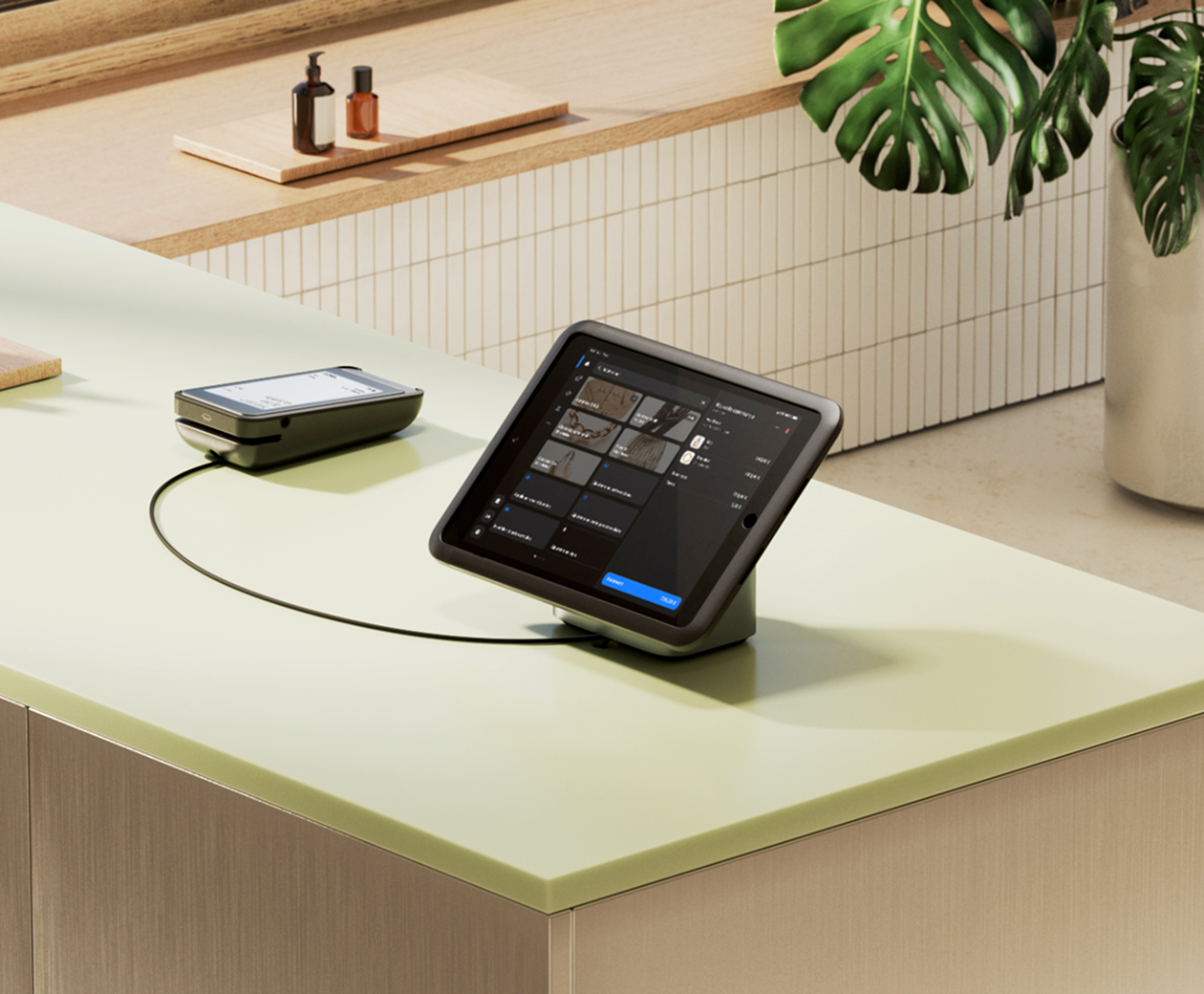 All the elements of Shopify POS sit on a retail counter: a laptop running the Shopify admin, a tablet mounted on a table stand running Shopify POS, the WisePad 3 ready to take tap and chip payments.
