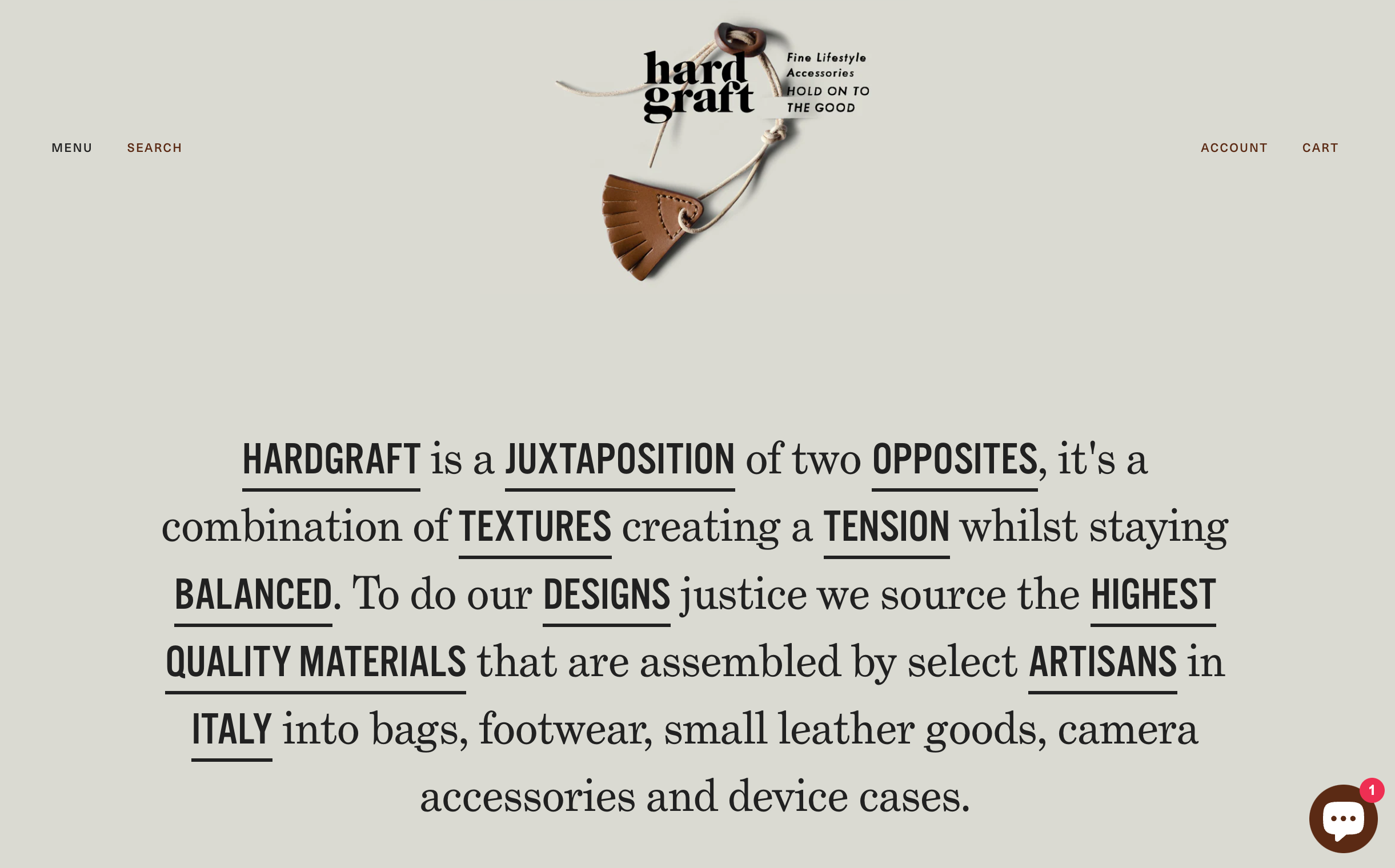 Hardgraft homepage with a leather tassel keychain and brand description text.