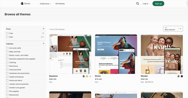Shopify Theme Store page showing previews of paid and free ecommerce themes like Keystone and Wonder.