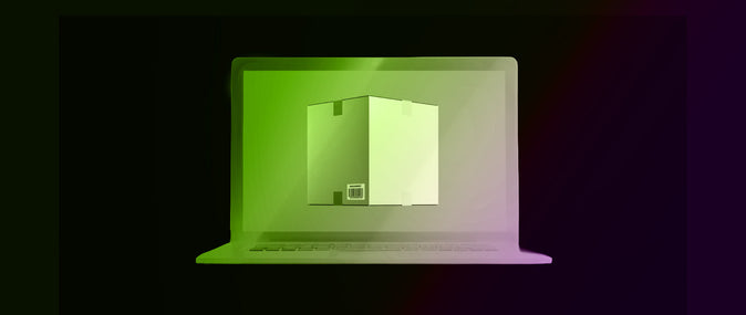 laptop screen with picture of cardboard package with barcode on screen all on a black background